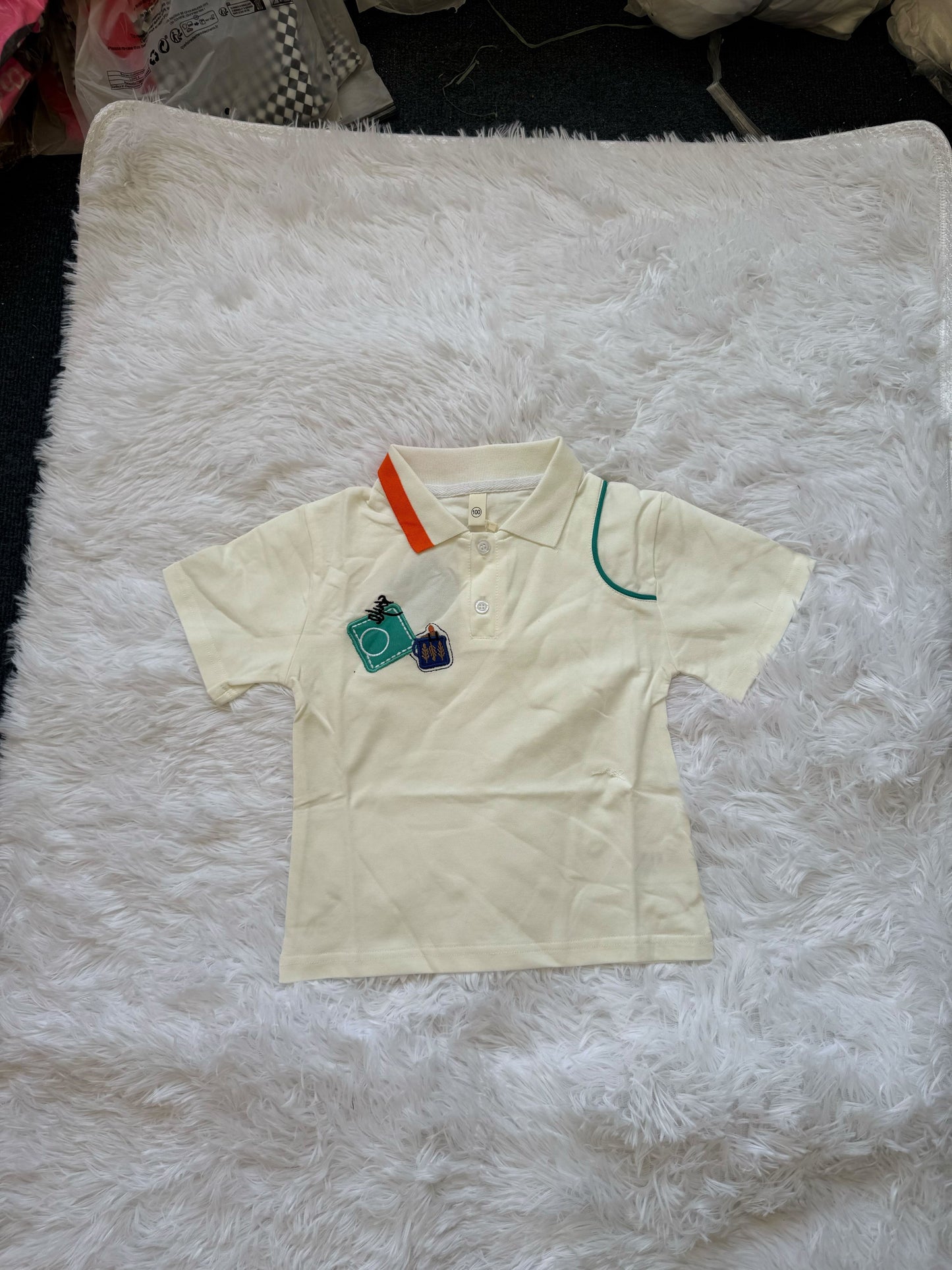 T-shirt with green and orange lines