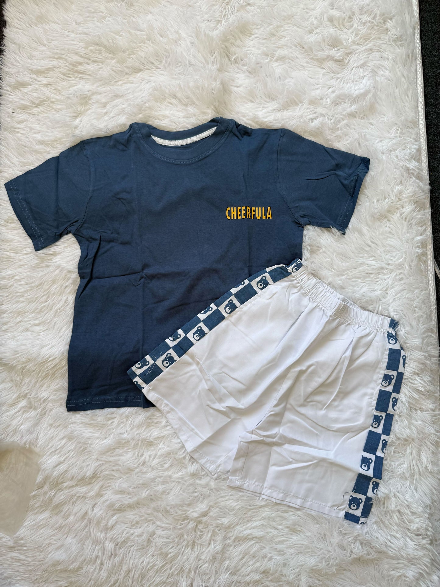 Blue T-Shirt with white shorts